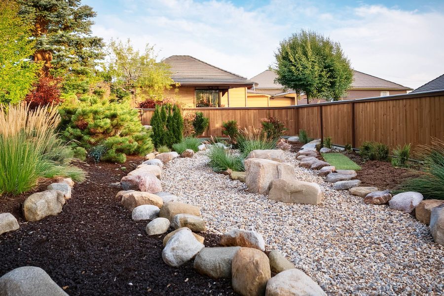 66eb35af6cfa963622f29e1e_river rock landscaping yard